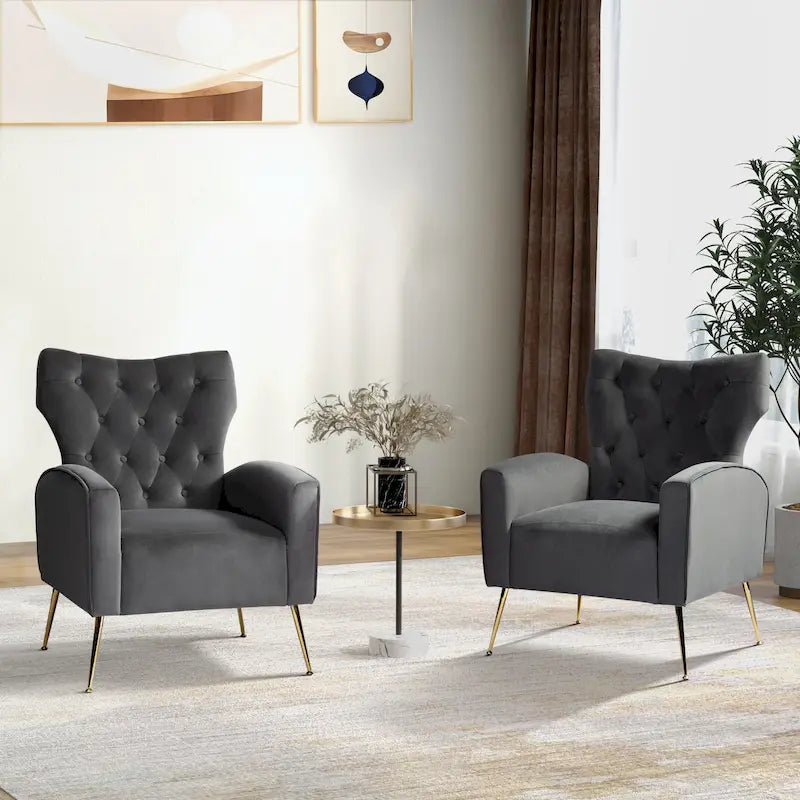 Fauteuil contemporain en velours capitonné à dossier haut avec pieds évasés en métal doré
