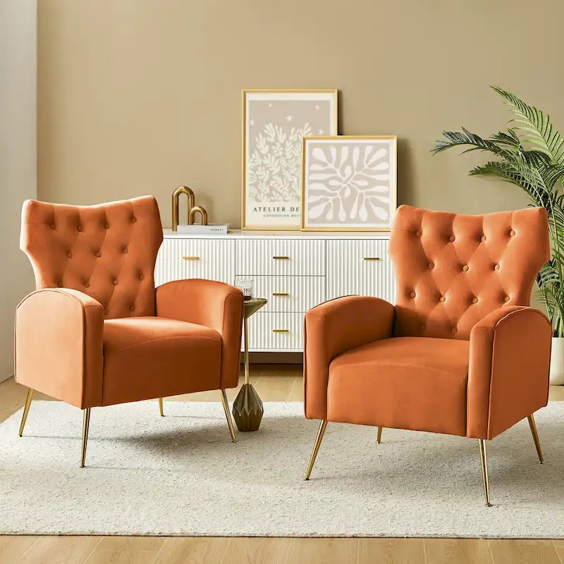 Fauteuil contemporain en velours capitonné à dossier haut avec pieds évasés en métal doré