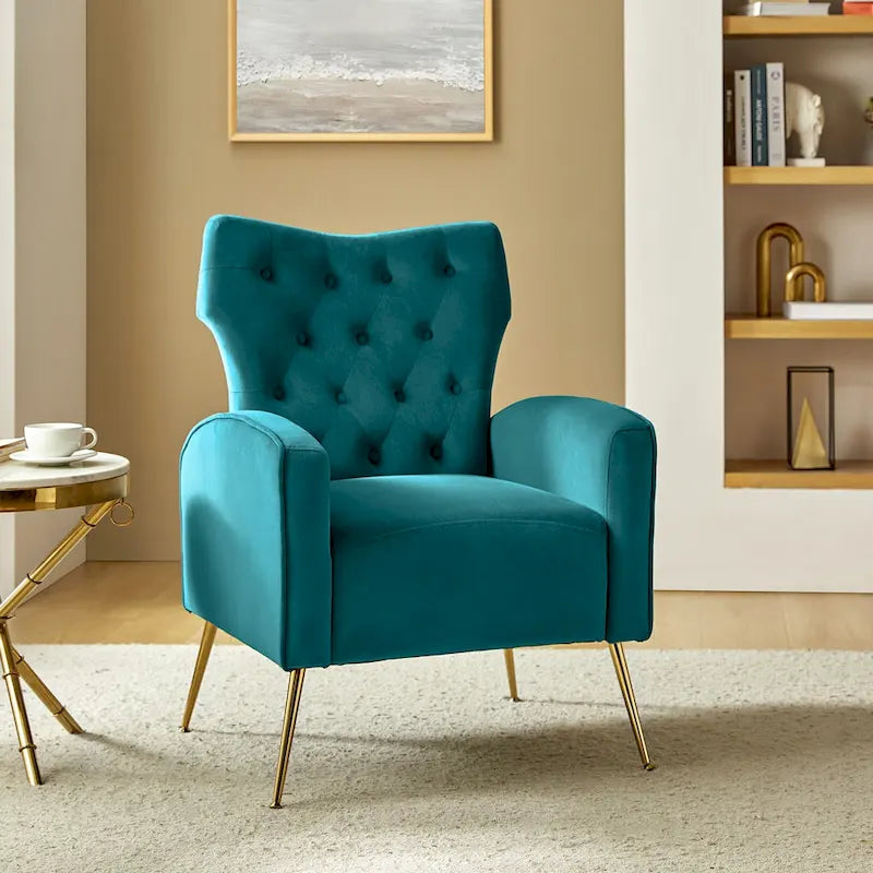 Fauteuil contemporain en velours capitonné à dossier haut avec pieds évasés en métal doré