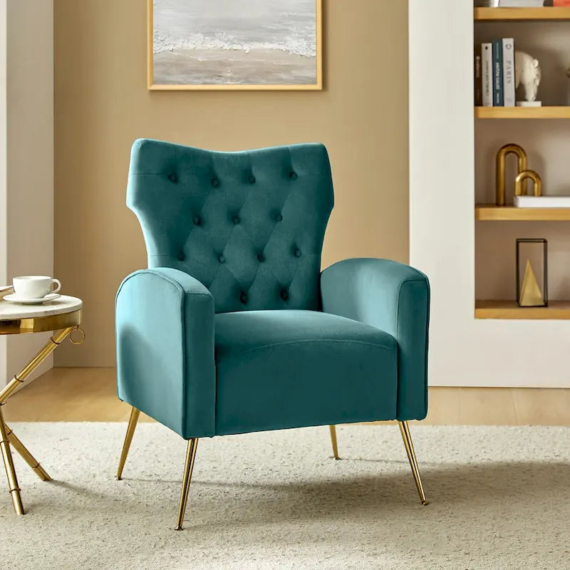 Fauteuil contemporain en velours capitonné à dossier haut avec pieds évasés en métal doré