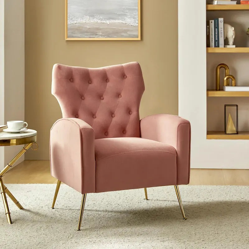 Fauteuil contemporain en velours capitonné à dossier haut avec pieds évasés en métal doré