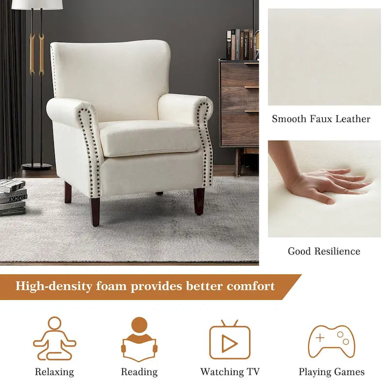 Fauteuil en cuir de transition avec accoudoirs roulés cloutés